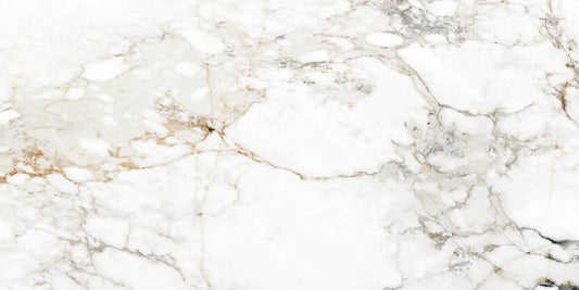 Barnaby polished porcelain tile with a white, gold, and silver marble design, for floors and walls. In a 24x48" size.