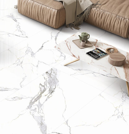 Bethany White polished porcelain tile with a white marble design, for floors and walls. Installed in a room.