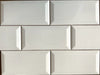 Biscuit glossy ceramic subway tile with a solid cream colour, for walls. In a 3x6" beveled size.