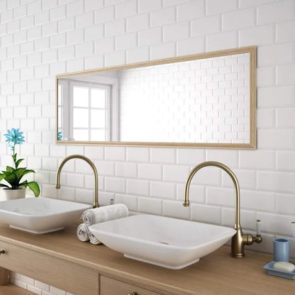 Biselado Blanco white glossy ceramic subway tile with a beveled edge, for walls. Installed on a vanity backsplash.