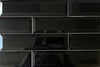 Biselado Negro black glossy ceramic subway tile with a beveled edge, for walls. Made in Spain, in a 3x12" size.