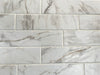 Bistrot Michelangelo matte porcelain tile with a marble design, for floors and walls. Made in Italy, in a 3x11" size.