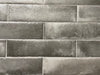 Brickell Antracita matte ceramic subway tile with an aged black style, for walls and backsplashes. In a 3x12" size.