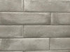 Brickell Gris matte ceramic subway tile with an aged grey style, for walls and backsplashes. In a 3x12" size.