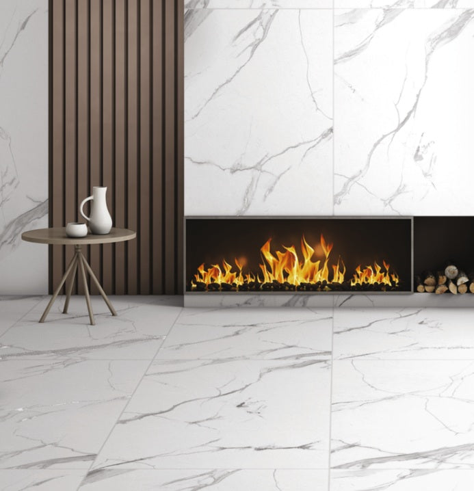 Bulgari Grey carving matte porcelain tile with a white marble design, for floors and walls. Installed in a room.