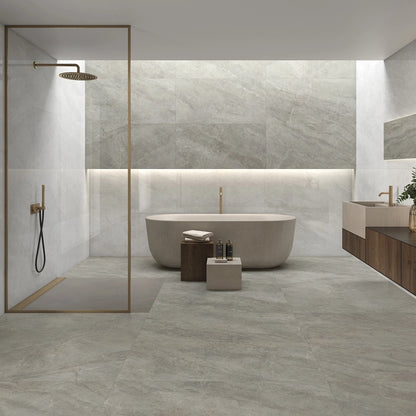 Caesars Natural polished porcelain tile with a greige quartzite design, for floors and walls. Installed in a room.