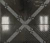 Capri Black glossy ceramic tile with a black and white diagonal connecting pattern. In a 18x18" size.