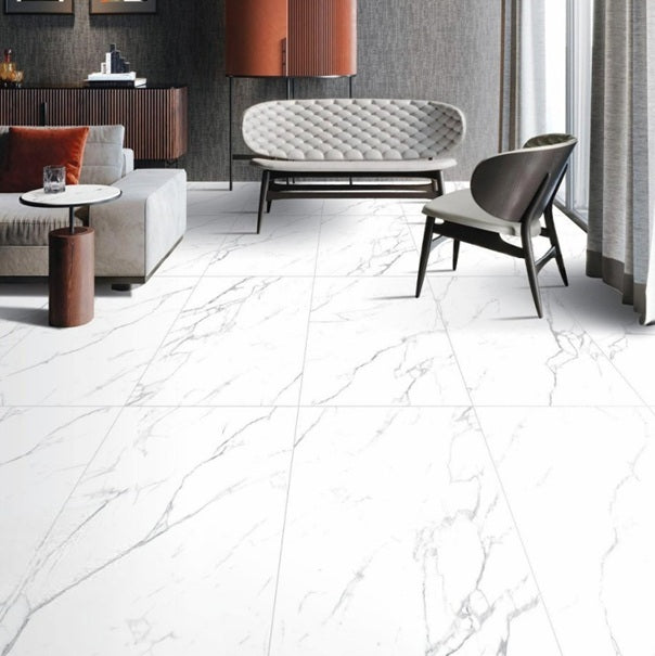 Carrara Royale polished/matte porcelain tile with a white marble design, for floors and walls. Installed in a room.