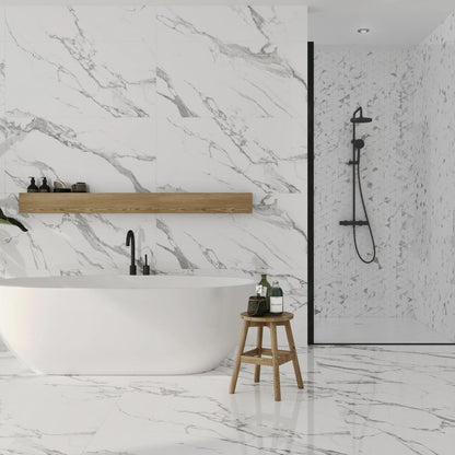 Carrara White polished porcelain tile with marble design, for floors and walls. Made in Spain, installed in a bathroom.