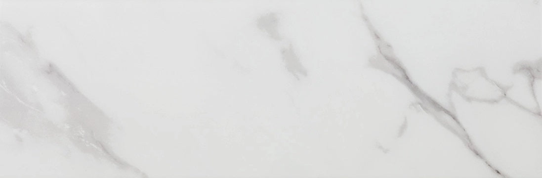 Casablanca glossy ceramic tile with a white marble design, for walls. Made in Spain, in a 12x36" size.