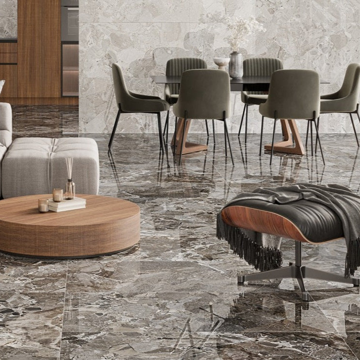 Ceppo Antracite polished porcelain tile with a rock/pebble design, for floors and walls. Installed in a room.