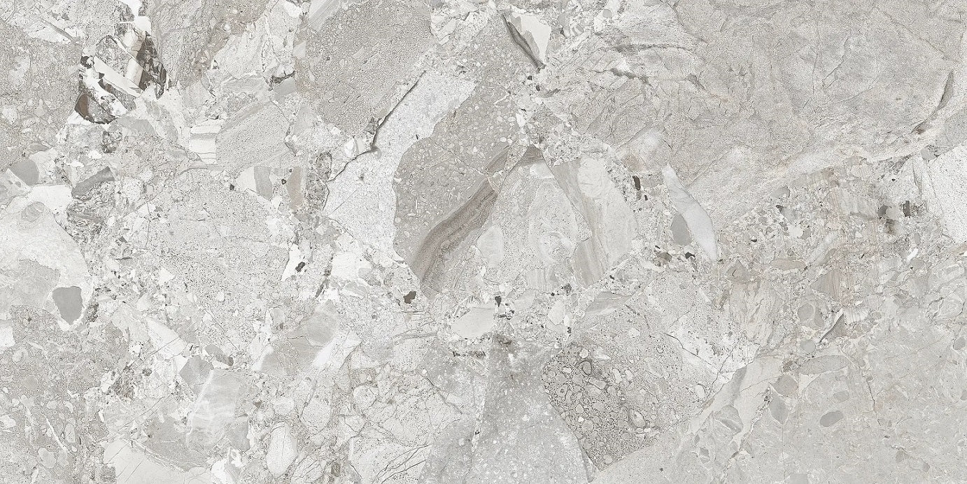 Ceppo White polished porcelain tile with a rock/pebble design, for floors and walls. Made in Spain, in a 24x48" size.
