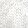 Pure white glossy mosaic tile with a chevron arrow shape, for walls and backsplashes.