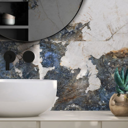 Crystal Sea polished porcelain tile with a warm white and blue marble design, for floors and walls. Installed in a room.
