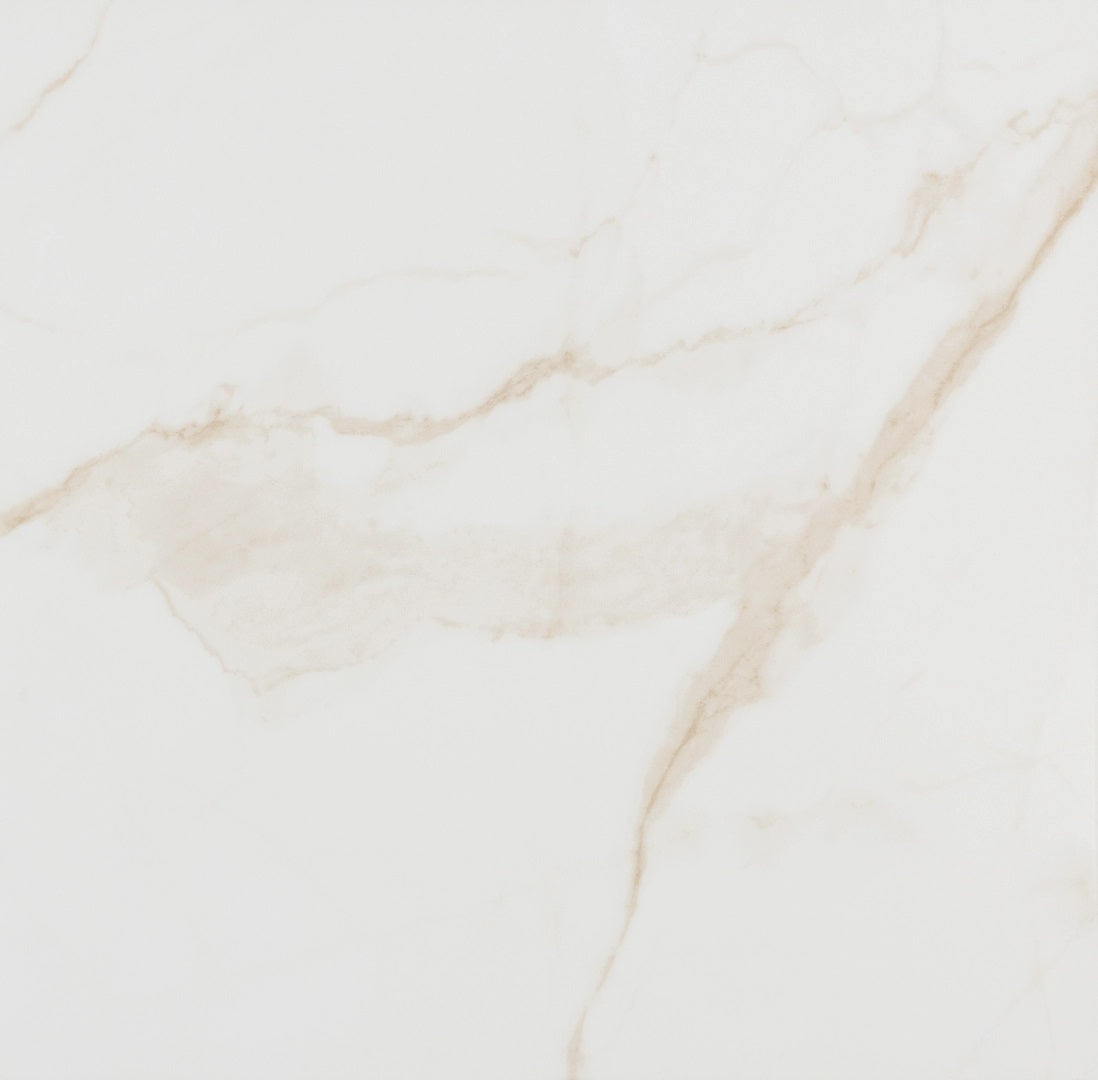 Essential Gold glossy porcelain tile with a white and gold marble design, for floors and walls. In a 24x24" size.