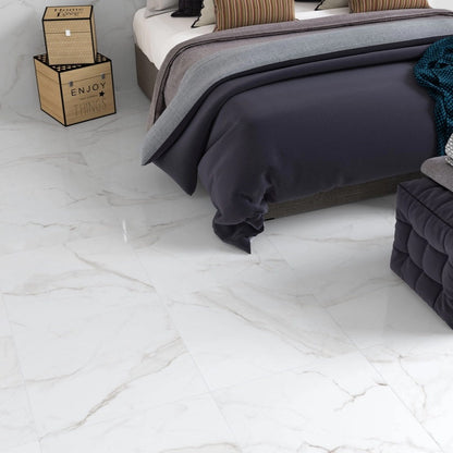 Essential White glossy porcelain tile with a white and grey marble design, for floors and walls. Installed in a room.