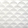 Pure white glossy mosaic tile with a scallop shape, for walls and backsplashes.