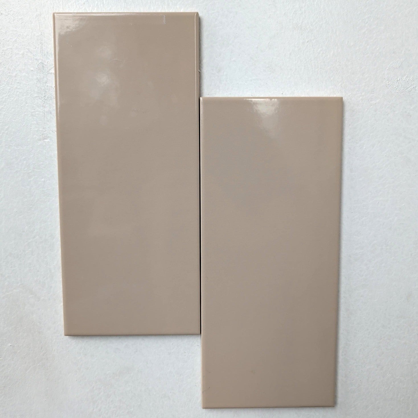 Fawn Subway solid beige/brown glossy ceramic subway tile, for walls. In a 4.5x10" size.