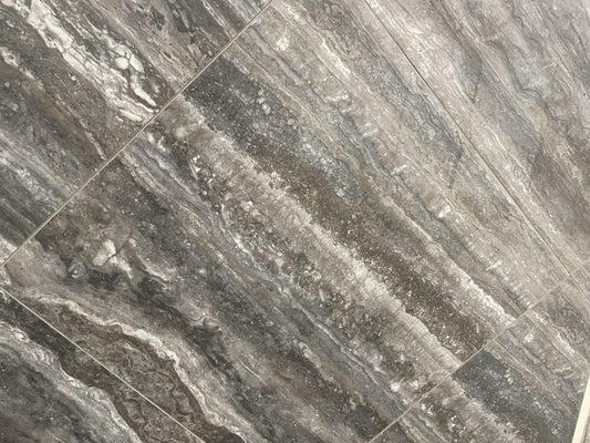 Ferrara Brown-Black polished porcelain tile with a stone design, for floors and walls. In a 24x24" size.