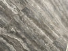 Ferrara Brown-Black polished porcelain tile with a stone design, for floors and walls. In a 24x24" size.