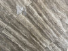 Ferrara Noce polished porcelain tile with a brown stone design, for floors and walls. In a 24x24" size.