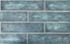 Fez Blue Spanish artisan style glossy ceramic subway tile with non-flat edges and surface, for walls. In a 3x12" size.