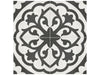 Form Monochrome Lotus matte porcelain tile with a connecting flower pattern in white and black. In a 8x8" size.