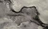 Glacial Nebula polished porcelain tile with light and dark grey onyx style. In a 30x60" size.