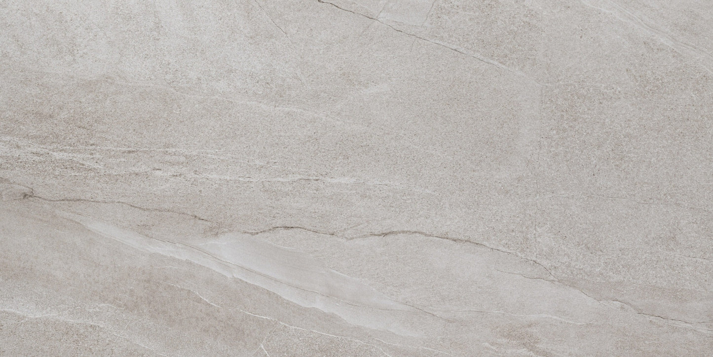 Halley Light sugar porcelain tile with a greige stone design, for floors and walls. Made in Spain, in a 24x48" size.