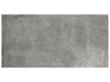 Industria Chromium matte porcelain tile with a dark grey cement stone style. In a 24x48" size.
