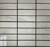 Lazio Mist polished porcelain tile with a grey stone design, for floors and walls. In a 1x3" mosaic size.