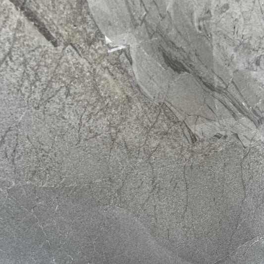 Lazio Silver polished porcelain tile with a stone design, for floors and walls. In a 24x24" size.