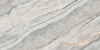 Livon Natural polished porcelain tile with a grey and gold marble/stone design, for floors and walls. In a 24x48" size.