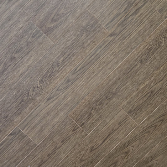 Loft Exhibition matte porcelain tile with a natural brown wood design, for floors and walls. In a 6x36" size.
