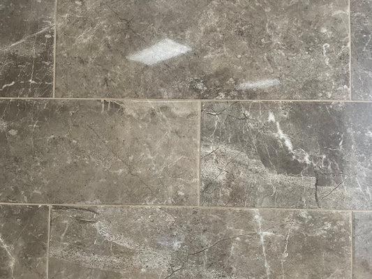 Louvre Nuez glossy ceramic tile with a brown design, for walls. Made in Spain, in a 10x28" size.