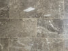 Louvre Nuez glossy ceramic tile with a brown design, for walls. Made in Spain, in a 10x28" size.