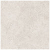 Lumino Dune matte porcelain tile in a beige stone style, for floors and walls. In a 13x13" size.