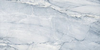 Macauba Blue polished porcelain tile with a marble design, for floors and walls. Made in Spain, in a 24x48" size.