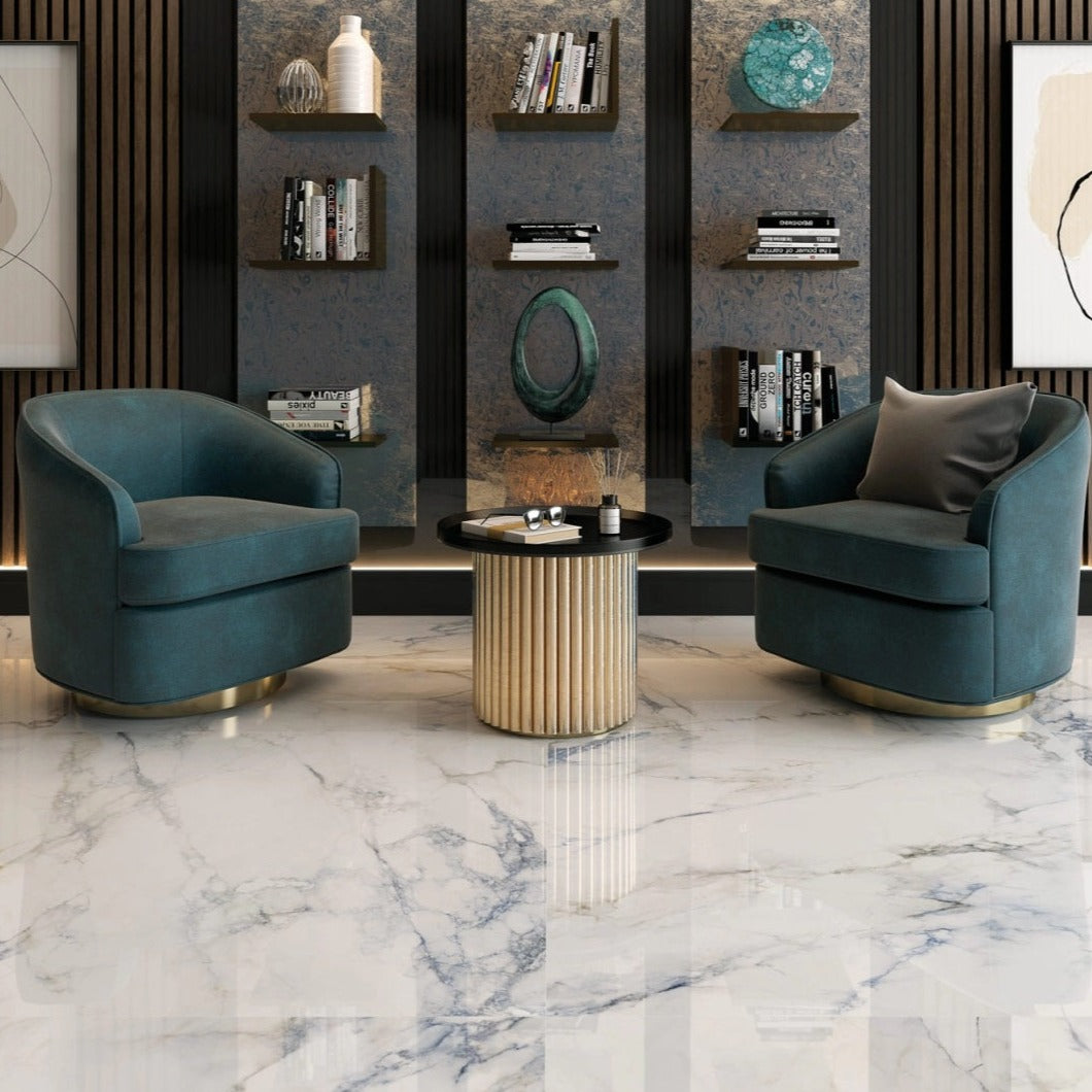 Mare polished porcelain tile with a white, blue, and gold marble design, for floors and walls. Installed in a room.