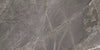 Marmi Grafito porcelain tile with a dark grey marble design, for floors and walls. Made in Spain, in a 24x48" size.