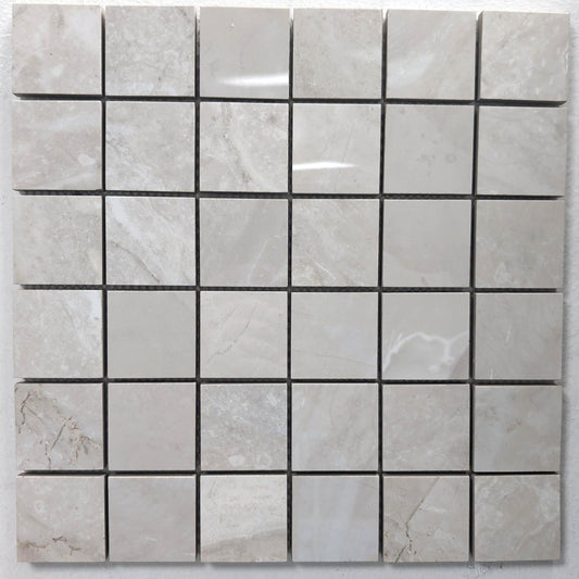 Onyx White polished porcelain mosaic with a white/grey onyx style, for floors and walls. In a 2x2" size.