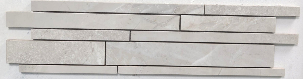 Onyx White polished porcelain mosaic with a white/grey onyx style, for floors and walls. In a random strip size.