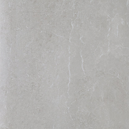 Kibal Gris glossy porcelain tile with a grey stone design, for floors and walls. Made in Spain, in a 24x24" size.