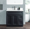 42 inch black MDF bathroom vanity with a white carrara quartz top, a chrome faucet, and black handles.
