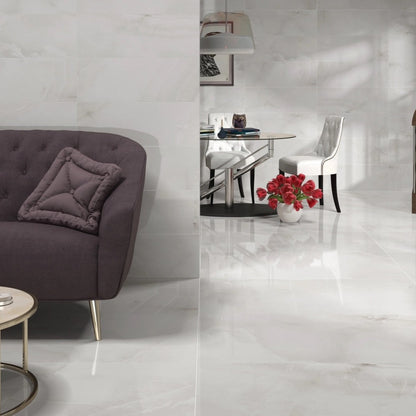 Mirage Cold glossy porcelain tile with a grey onyx design, for floors and walls. Made in Spain, installed in a room.