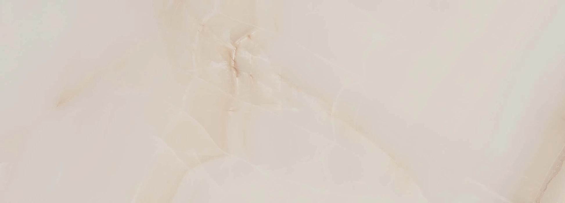 Mirage Warm glossy ceramic tile with a beige onyx design, for walls. Made in Spain, in a 10x28" size.
