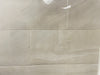 Moondust Kashmir polished porcelain tile with a beige marble style, for floors and walls. In a 12x24" size.