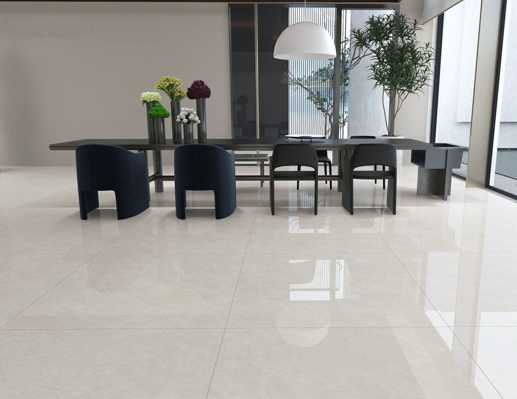 Moonstone polished porcelain tile in a warm grey/beige marble style, for floors and walls. Installed in a room.