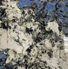Morning Glory polished porcelain tile with white, blue, and black colours. A close up image of it.