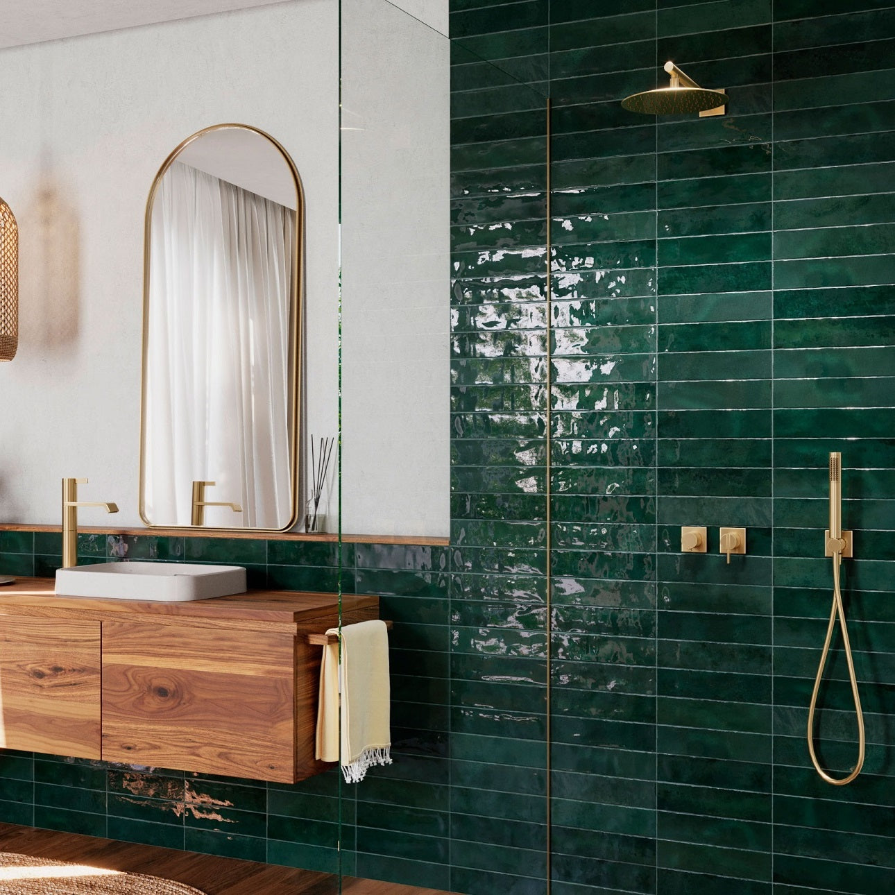 Nairobi Green artisan style glossy ceramic subway tile with non-flat edge and surface. Installed on a bathroom wall.
